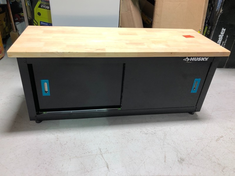lot 102 image: Husky  20 in. H x 48 in. W x 18 in. D Steel Storage Bench not used whits small scratchs