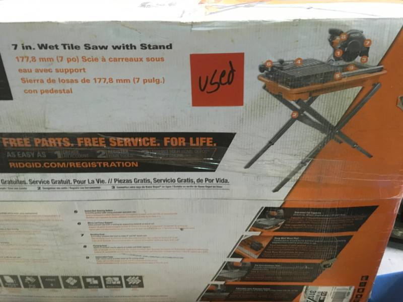lot 28 image: RIDGID 7 in. Tile Saw with Stand LIGHTLY USED in good condition
