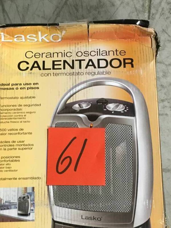 lot 61 image: Lasko 11.25 in. 1500-Watt Oscillating Ceramic Electric Portable Heateropen box in like new condition