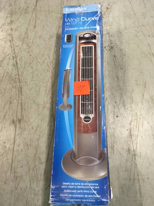 lot 99 image: Lasko Wind Curve 42 in. Oscillating Tower Fan with Fresh Air Ionizer not used
