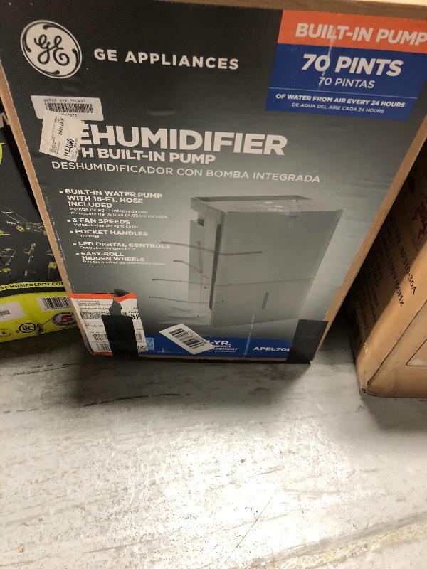 lot 115 image: GE Dehumidifier with Built-in Pump APEL70LW IN GOOD CONDITIONS