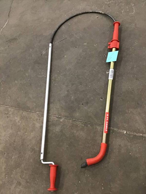 lot 6 image: Milwaukee Trap Snake 6 ft. Toilet Auger Drain Cleaning Kit in good condition