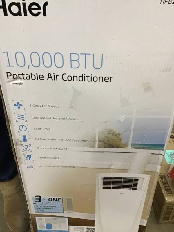 lot 9 image: Haier 10,000 BTU Portable Air Conditioner with Dehumidifier open box in like new condition