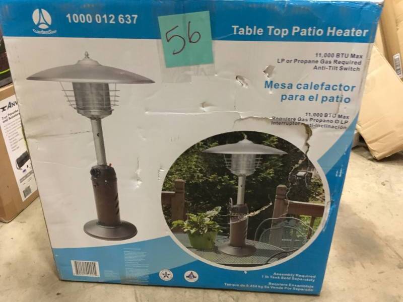 lot 56 image: Hampton Bay 11,000 BTU Powder Coated Bronze Tabletop Propane Patio Heater open box in like new condition