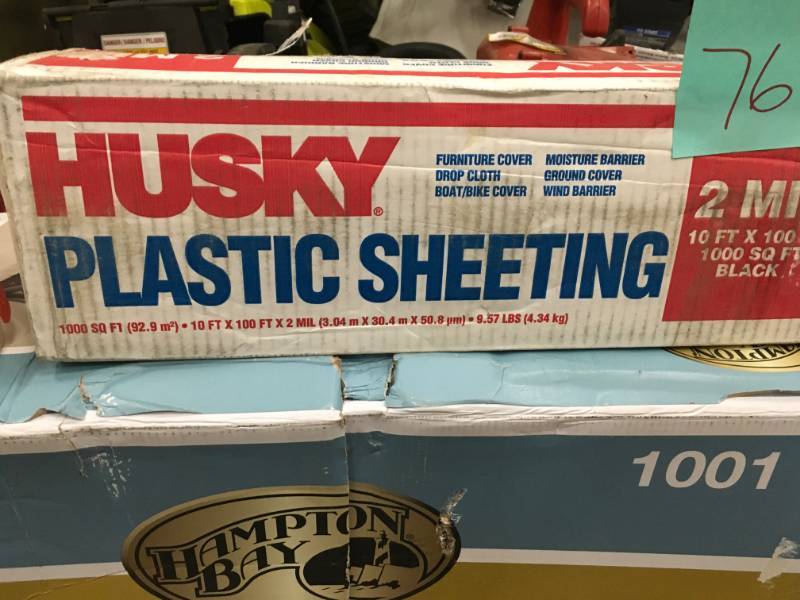 lot 76 image: HUSKY 10 ft. x 100 ft. Black 2 mil Plastic Sheeting open box in like new condition