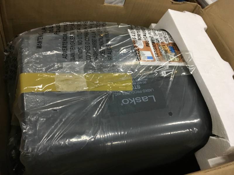 lot 86 image: Lasko 1,500-Watt Electric Portable Cool-Touch Infrared Quartz Heater open box in like new condition