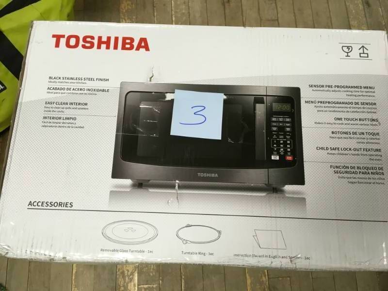 Toshiba 1.2 cu. ft. Black Stainless Steel Countertop Microwave Oven with Smart Sensor open box in good condition