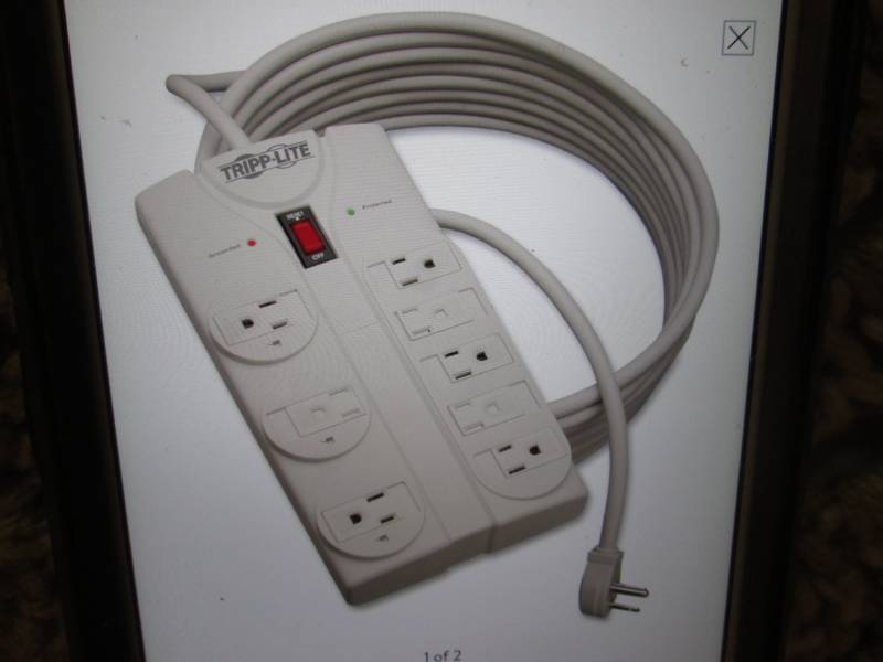 lot 30 image: Tripp-Lite 8-Outlet Surge Suppresso...