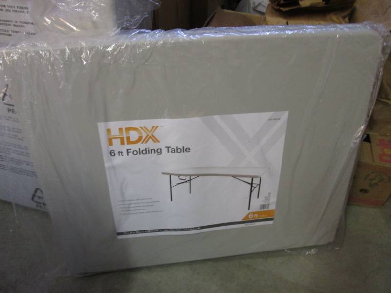 lot 127 image: HDX 6 ft Folding Table In plastic s...