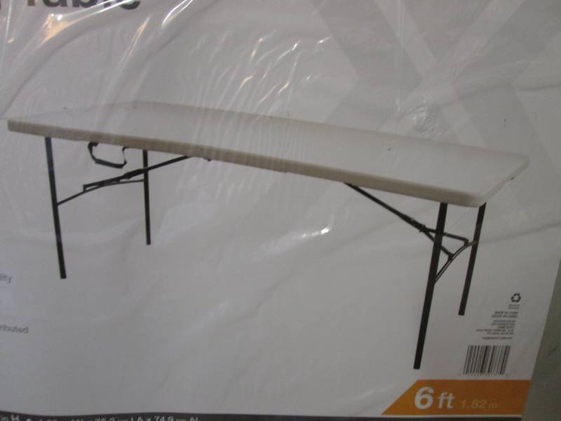 lot 130 image: HDX 6 ft Folding Table In plastic s...