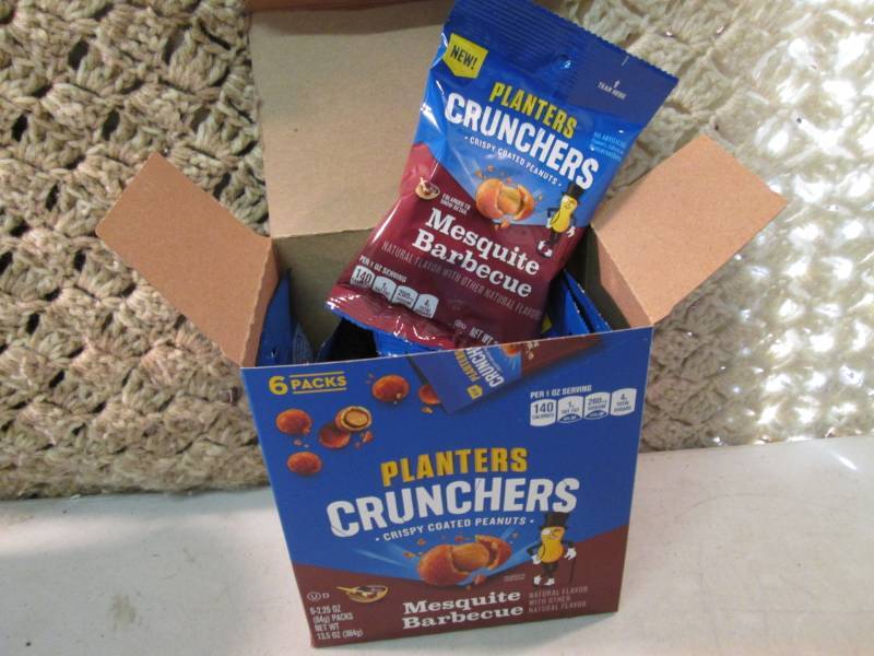 lot 184 image: Box with 6 Bags of Planters Crunche...
