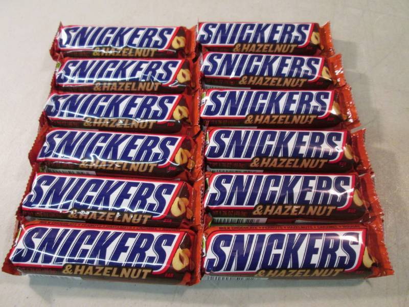 lot 259 image: 12 Snickers & Hazelnut Candy Bars B...