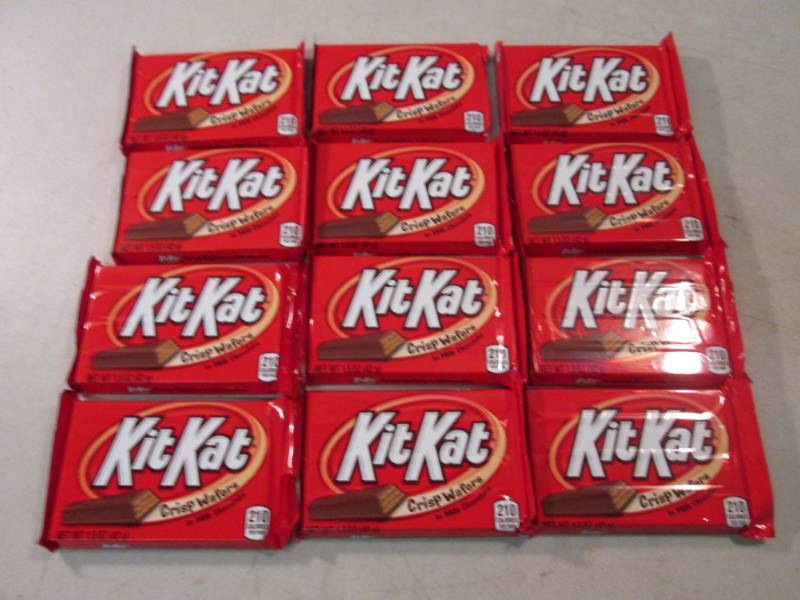 lot 260 image: 12 Kit Kat Candy Bars Best by Dec 2...
