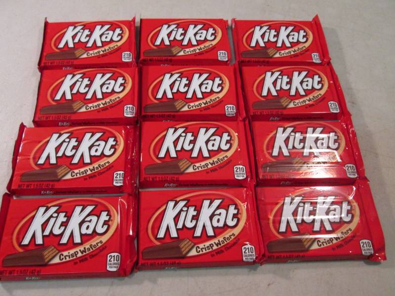 lot 261 image: 12 Kit Kat Candy Bars Best by Dec 2...