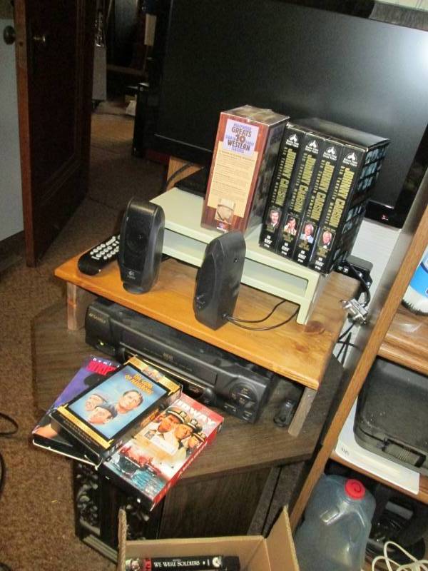 lot 59 image: Shelf, movies, monitor, as pictured...