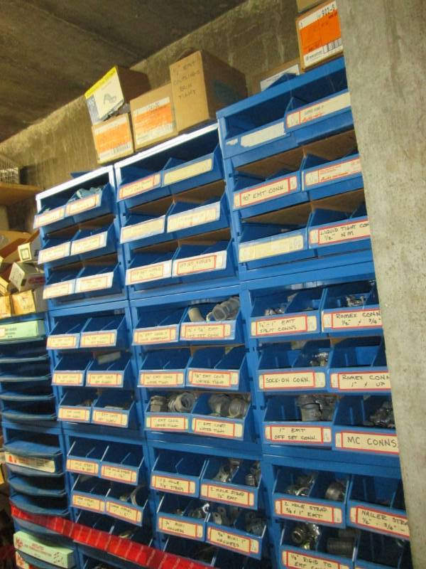 lot 112 image: Large display case lot of metal con...