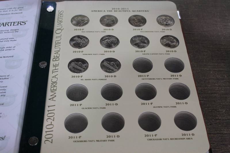 lot 15B image: Smokey the Bear American the Beautiful Quarter Dollar Collectors Album  2010-2021 Incomplete Set