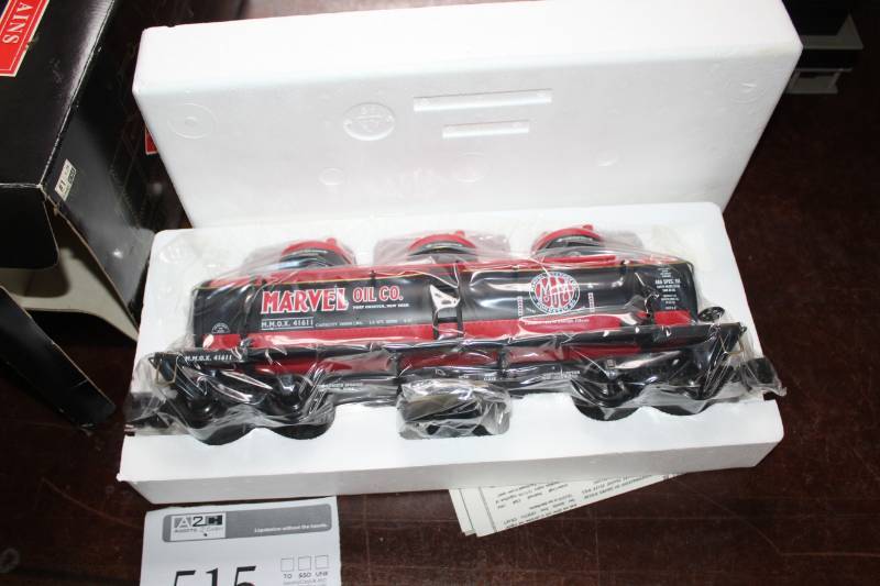 lot 515 image: Polks Model Craft Hobbies Inc. Scale Train Marvel Oil Triple-Dome Tank Car