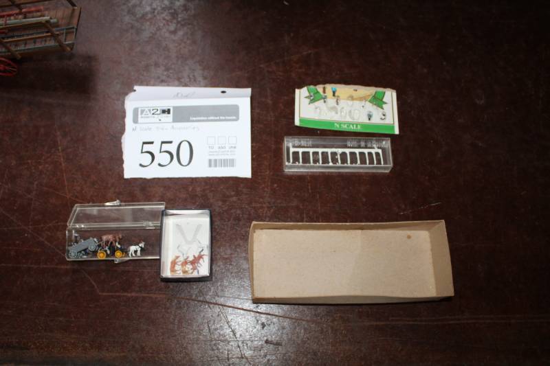 lot 550 image: N-Scale Model Train Accessories - Animals, Wagons, And More