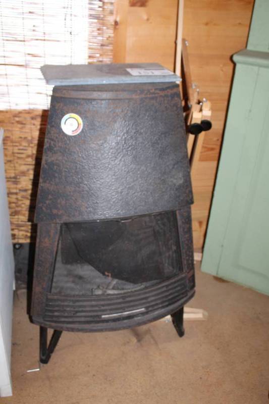 lot 151 image: Montgomery Ward Cast Iron Wood Burning Stove