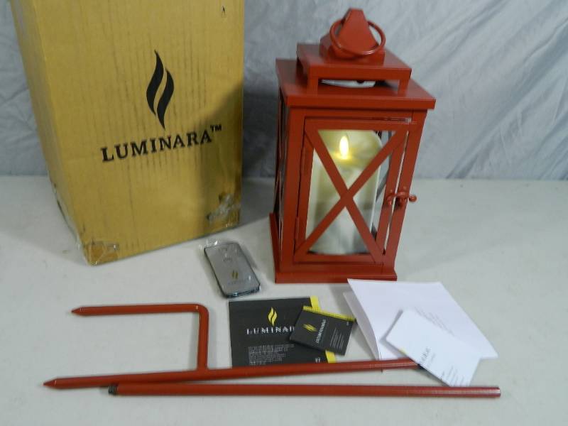 lot 37 image: Luminara Flameless Candle with Lantern, Remote, and Stand