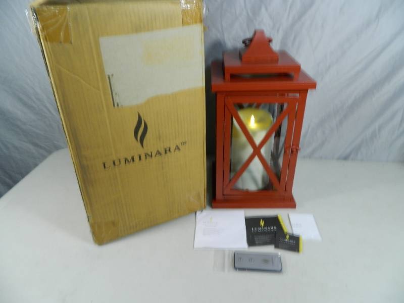 lot 38 image: Luminara Flameless Candle with Lantern and Remote
