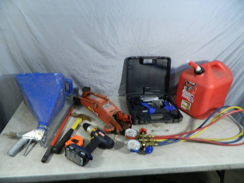 lot 135 image: Refridgerant Gauges, Nail Gun, Texture Gun, and More