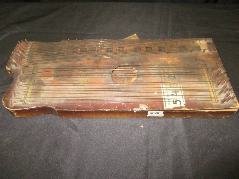 lot 10 image: Vintage Marx Violin-Uke.  Has Damage