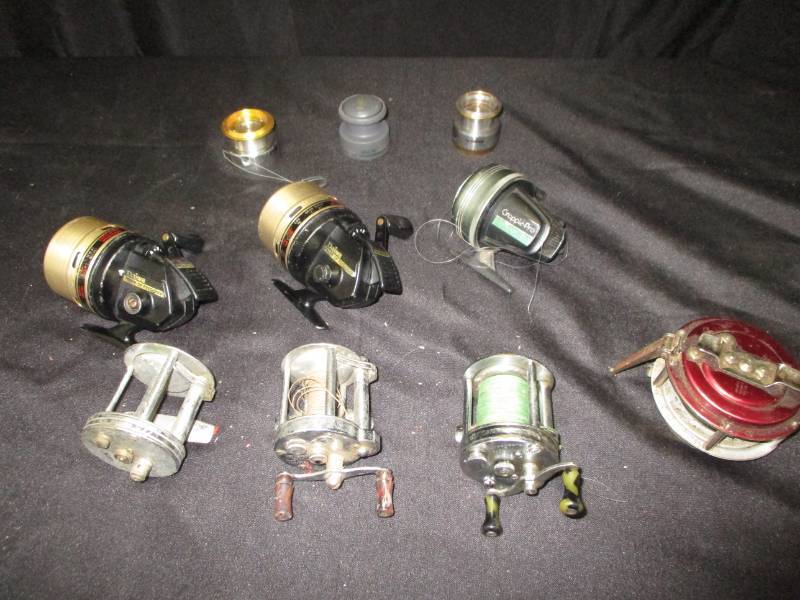 lot 40 image: bunch of reels, Phlueger Akron, Phlueger Trump, and more