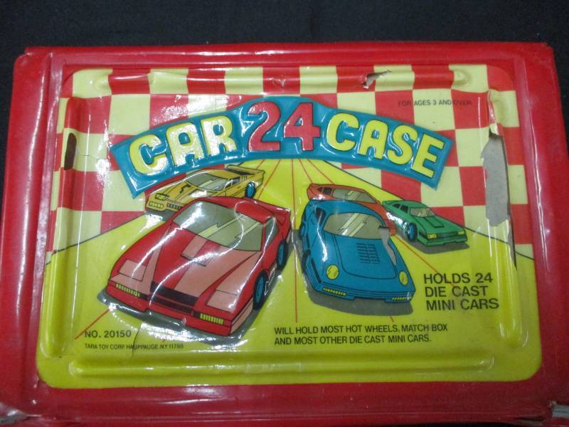 lot 127 image: Matchbox and Hotwheel cars and case