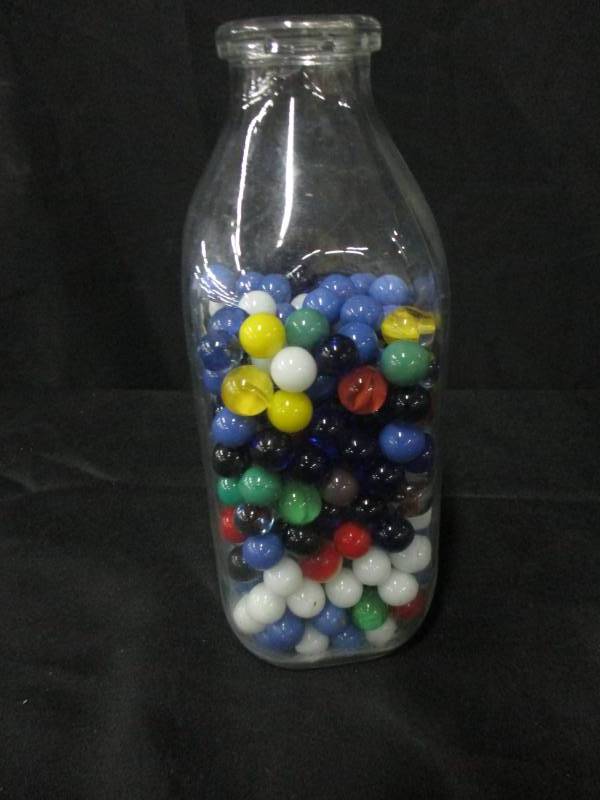 lot 174 image: Pint and half of marbles