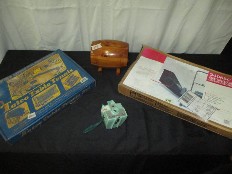 lot 195 image: Old imperial flash for camers, Mower side charge grass catcher, barrel bank, and tennis table