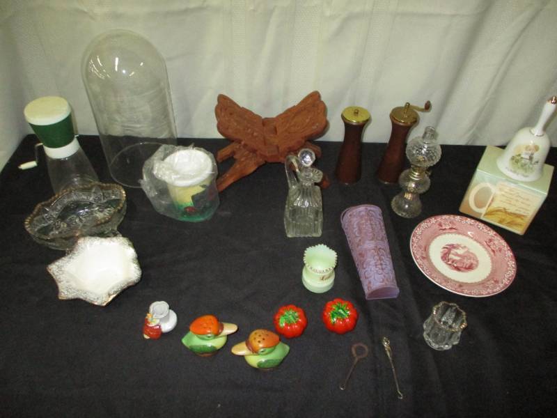 lot 196 image: salt and pepper shakers, toothpick holders, bell, plates,