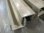 lot 120 image: 11 Twelve Foot Sections of Light Brown Color Plastic, Under The Door Floor Sweep.