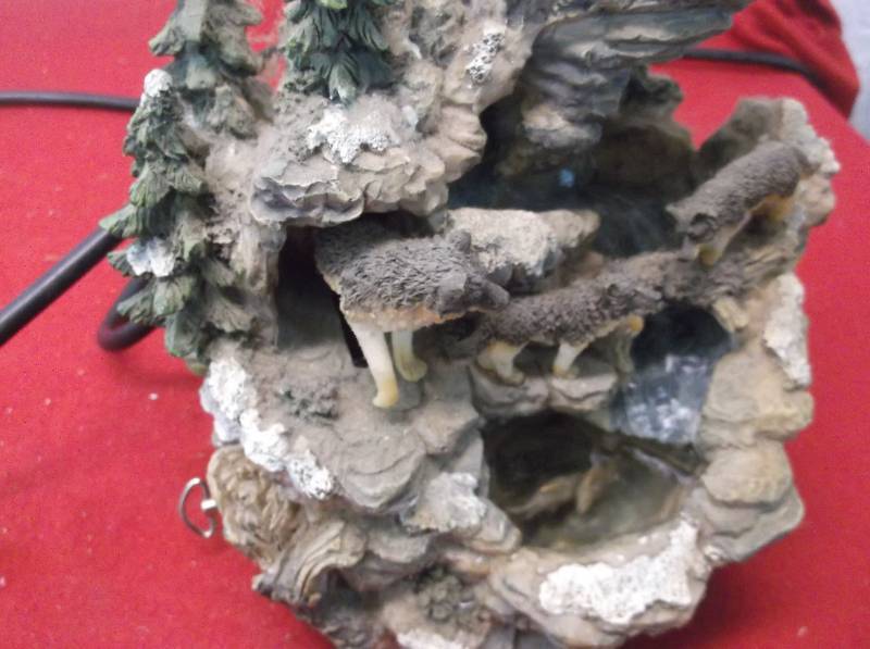 Decorative Waterfall with Traveling Wolf Out of Mountain