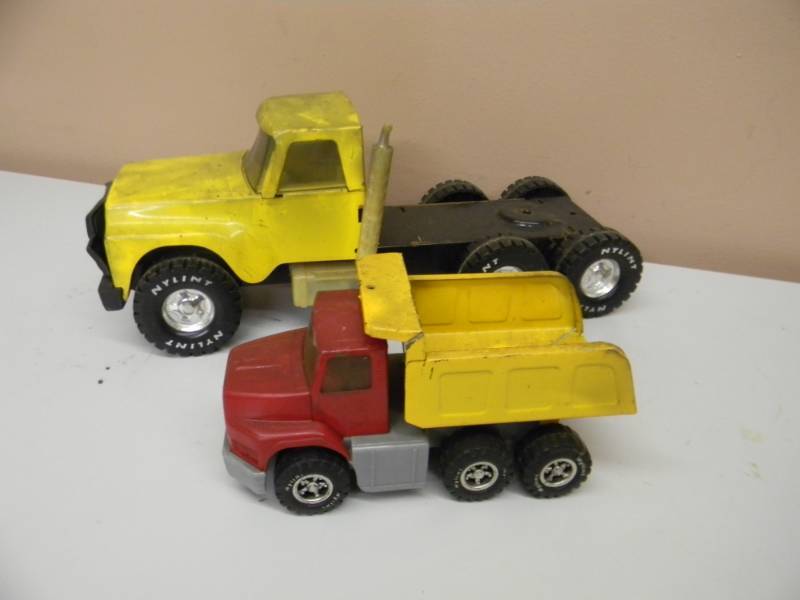 lot 63 image: 2 VINTAGE NYLINT TOY TRUCKS - SEE PICTURES