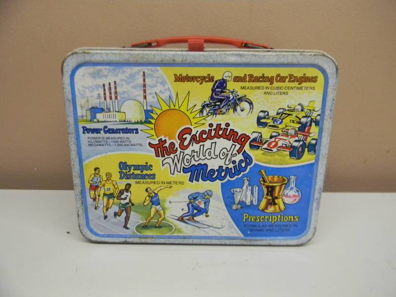 lot 23 image: VINTAGE RARE 1976 KING-SEELEY THERMOS CO. METAL LUNCH BOX - THE EXCITING WORLD OF METRICS - SEE PICTURES