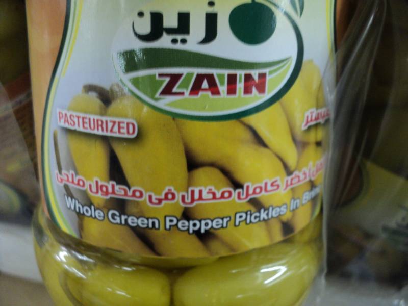 lot 142 image: 24 jars of Zain Whole Green Pepper ...