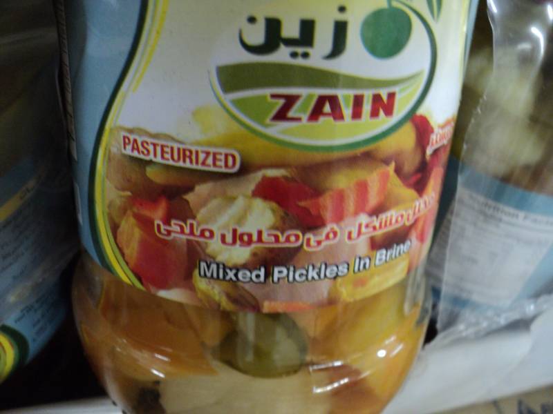 lot 144 image: 24 jars of Zain Mixed Pickles in Br...