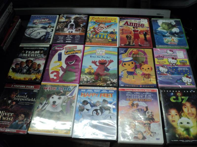 lot 219 image: Lot of 90 PG-13 DVDs see all pict...