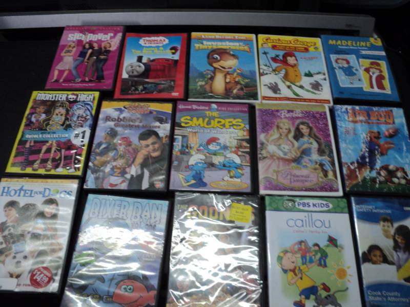 lot 232 image: Lot of 90 PG-13 DVDs see all pict...