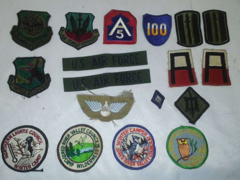 lot 61 image: Military and Boy Scout patches.