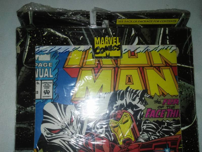 lot 74 image: Marvel Premiere Iron Man collectors pack seems there are 3 included.