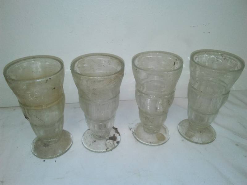 lot 93 image: 4 soda glasses fresh from the shed.