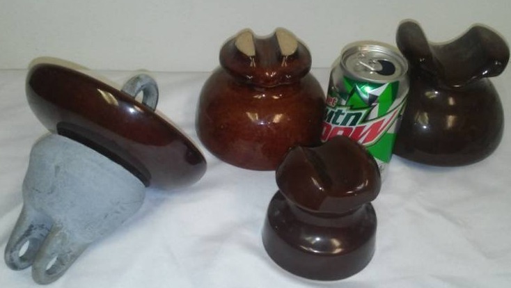 lot 96 image: 4 ceramic insulators.