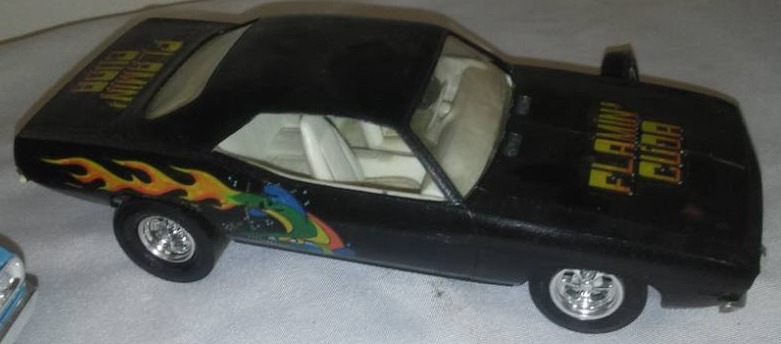lot 101 image: Model cars, 125 scale - Mopar, Flamin Cuda, duster six pack, barracuda. A little TLC.