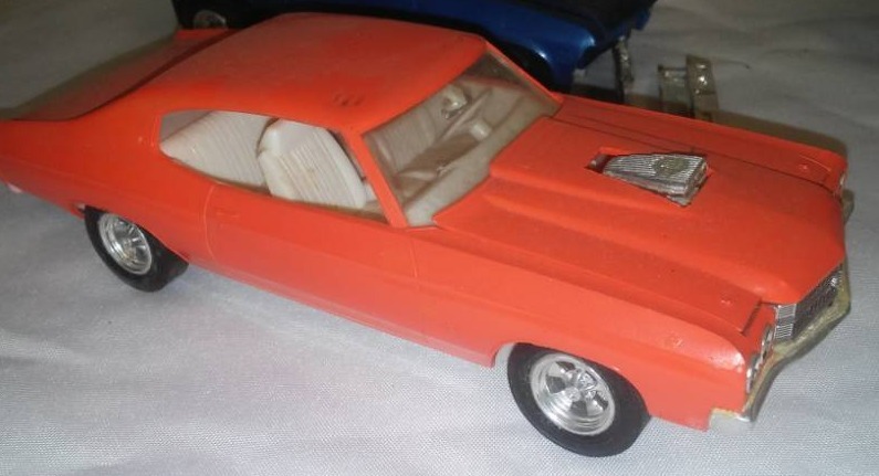 lot 104 image: Model cars, 125 scale GM muscle 57 Bel Air, GTO, Chevelle, Nova. Some TLC.