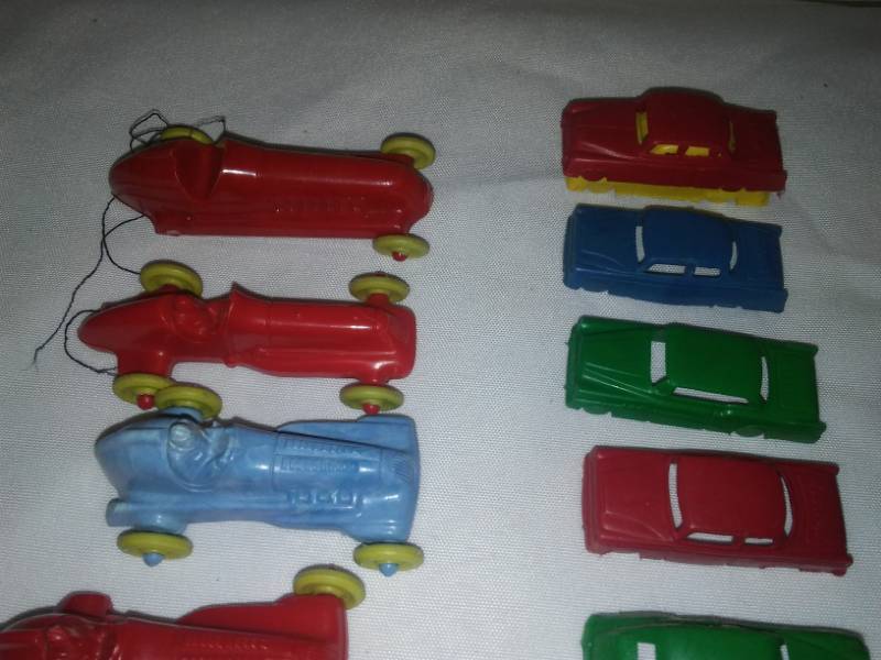 lot 107 image: Vintage plastic animals, vehicles and soldiers pink people, Santa.