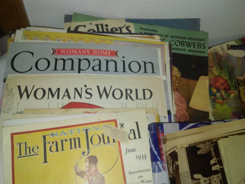 lot 115 image: Dozens of vintage advertisements and magazine covers, newspaper clippings.