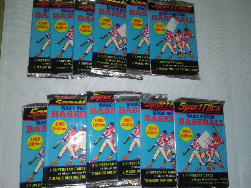 lot 136 image: 1993 trivia MLB game and 12 wax packs.